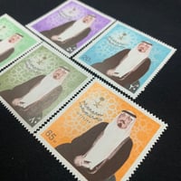 طابع مرور 50 عام على توحيد المملكة ومبايعة الملك ف...