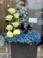 تنسيق الهدايا بلورد على كيس اسود