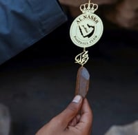 تعليقه النصر مع كسرت العود بلاسم حسب الطلب