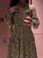 فستان سهرة طويل تل أخضر فاخر مع شك براق وأكمام منف...