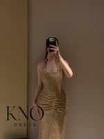 فستان استرتش ذهبي بلمعة فاخرة ومرونة أنيقة