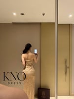 فستان استرتش ذهبي بلمعة فاخرة ومرونة أنيقة