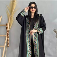 فروة شتوية سوداء مطرزة - أناقة وفخامة الشتاء