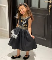 فستان الحرف العربي