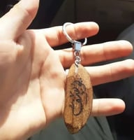 ميداليه بكِسرة العود