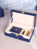 علب جلد ( أوقيتين و 2 ربع توله ) فارغه