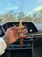 تعليقة سيارة عود مع رسمة الصقر