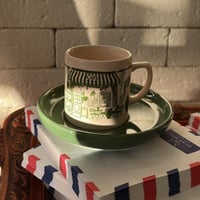 كوب قهوة من البورسلين بتصميم المقهى من ‎بيلا ميزون...