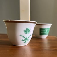 فنجال يحمل شعار ( سيفين ونخلة - المملكة العربية ال...