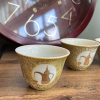 فنجال ياباني اصدار قديم - يحمل شعار الدلة