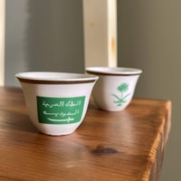 فنجال يحمل شعار ( سيفين ونخلة - المملكة العربية ال...