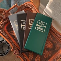 دفتر " البطاقات " من اهداءات كعكي كولا