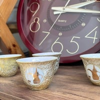 فنجال ياباني اصدار قديم - يحمل شعار الدلة