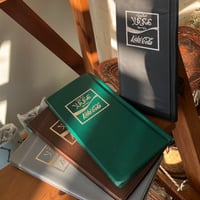 دفتر " البطاقات " من اهداءات كعكي كولا