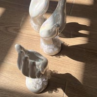 تحفة خزف فنتج مزيّنه بقماش