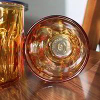 قلاص لون الكهرمان | صناعة اندونيسية فنتج