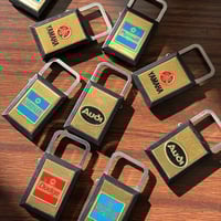 ميدالية فنتج على شكل قفل