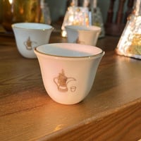 فنجال عتيق | يحمل شعار الدلة