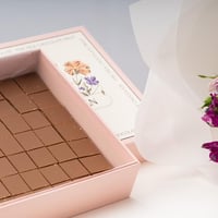 باقة جمال البنفسج مع مكعبات الكراميل من هانوفيرين