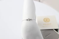 اساور رقم 3 من الذهب الابيض عيار 18