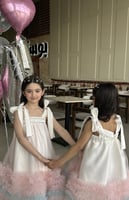 فستان من التل الوردي