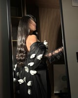 فستان سهرة بتفاصيل ورد انيقة