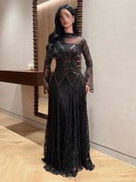 فستان سهرة فاخر يجمع بين الكريستال والدانتيل الفرن...