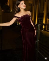 فستان شتوي أنيق عنابي بتفاصيل براقة فساتين المصممة...