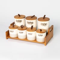 طقم علب بهارات 7 حبات بقاعدة خشبيه