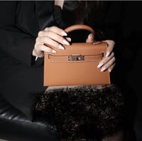 شنطة ميلي كلير