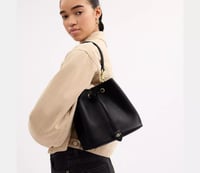 شنطة كوتش/روان بوكيت