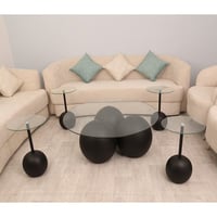 طقم طاولات رخام صناعي شكل كوره لون اسود سطح زجاج