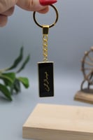 ميدالية مفاتيح بتصميم انيق وخفيف باللون الاسود الم...