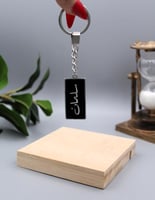 ميدالية مفاتيح بتصميم انيق وخفيف باللون الاسود الم...