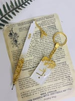 طقم قلم وميدالية انيقة مزخرفه بورق الذهب او الفضة...