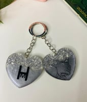 ميدالية مفاتيح على شكل قلب مطرز بورق الفضه من الري...