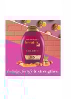 أو جي أكس شامبو ضدّ التكسّر مع زيت الكيراتين 385 م...