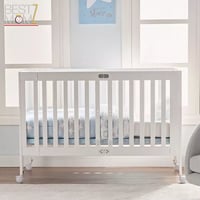 سرير اطفال خشبي قابل للطي