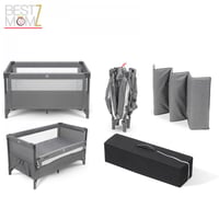 سرير أطفال متنقل بجانب سرير الأم