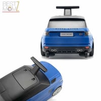 شنطة سفر ولعبة ركوب