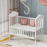 سرير اطفال خشبي بتصميم انيق