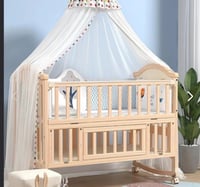 سرير أطفال خشبي هزاز متعدد الاستخدامات