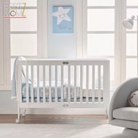 سرير اطفال خشبي قابل للطي