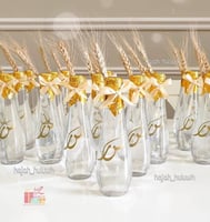 علب مويه مع الكتابه