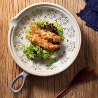 صحن على شكل مقلاة