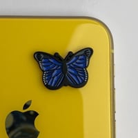 استكر جوال | فراشة كحلي