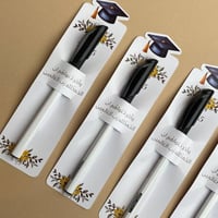 توزيعات أقلام للتخرج