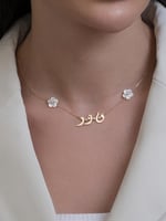 سلسال ذهب مطلي بالاسم ووردتين صدف