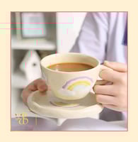 كوب قوس المطر اصفر