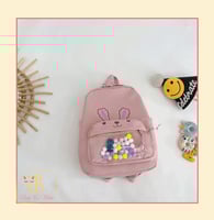 حقيبة ظهر وردية وسط